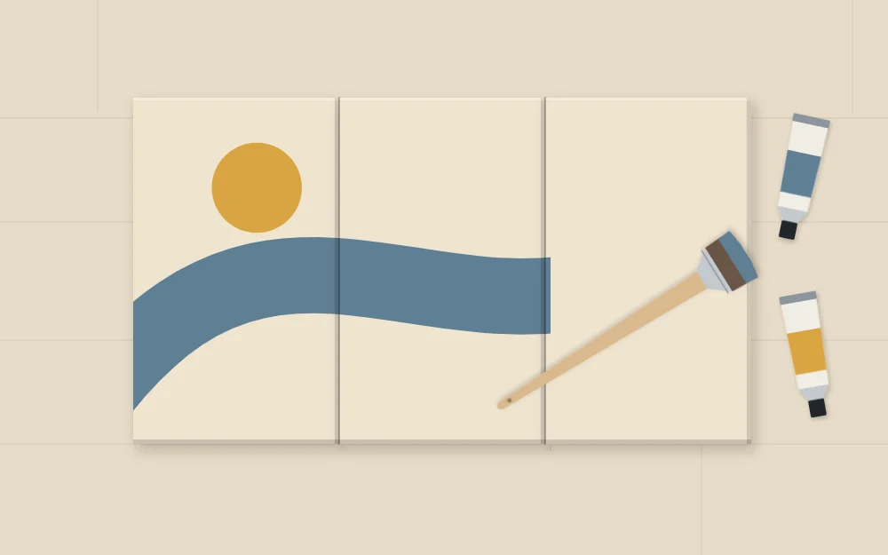 Three canvases pushed together edge to edge on a table with one large curve painted across them