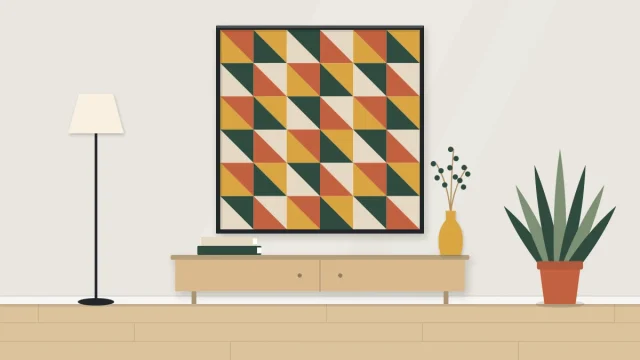 Square artwork on a wall filled with a grid of triangles in four colors forming a repeating pattern