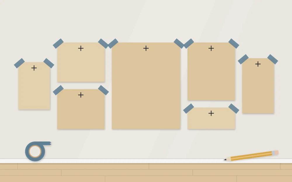 Plain paper rectangles taped to a wall as templates, each with a small mark near the top