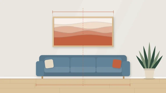 A sofa with a single wide artwork above it and faint dimension lines showing the art is narrower than the sofa and centered